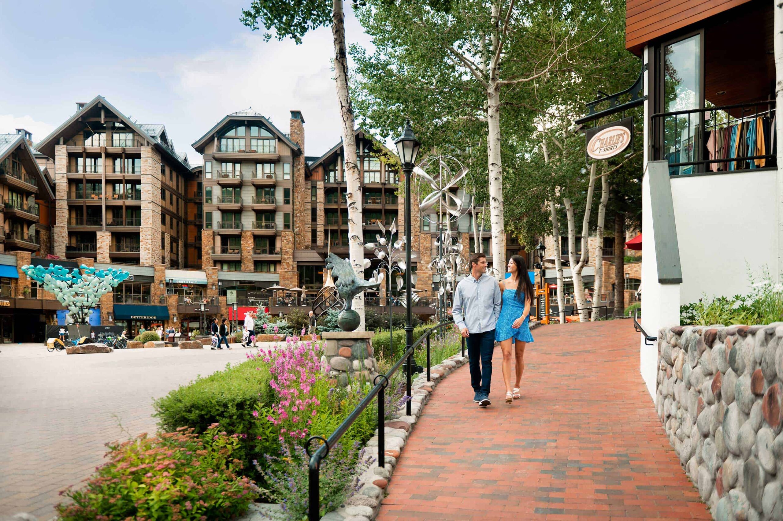 Couple walking in Vail Village near Solaris Residences